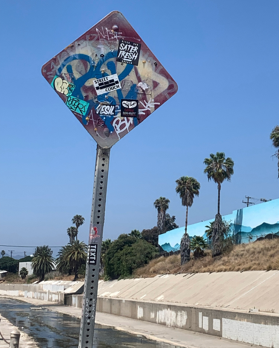 street couch sticker on ballona creek in los angeles
